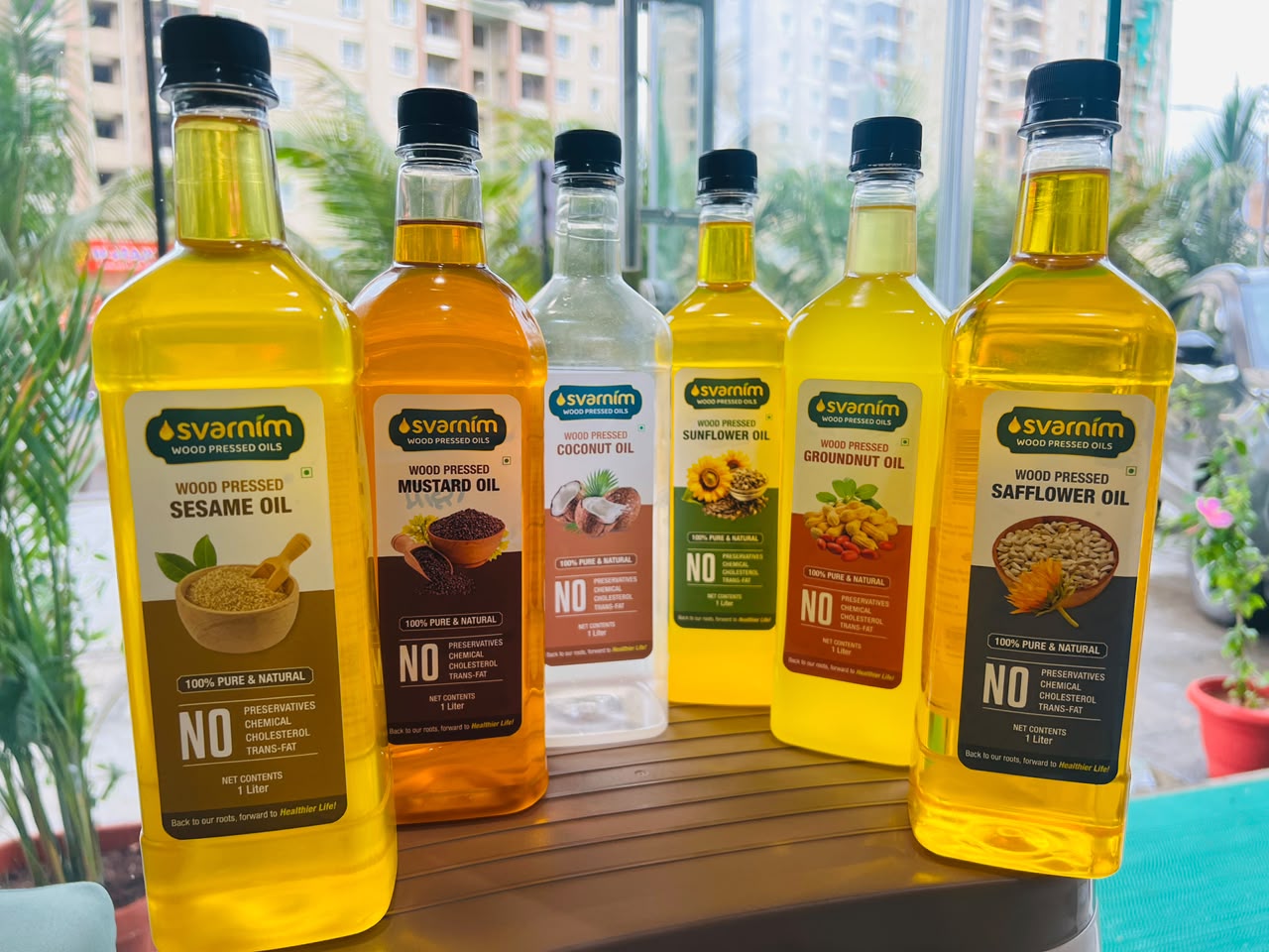 The full Svarnim wood-pressed oil range on display