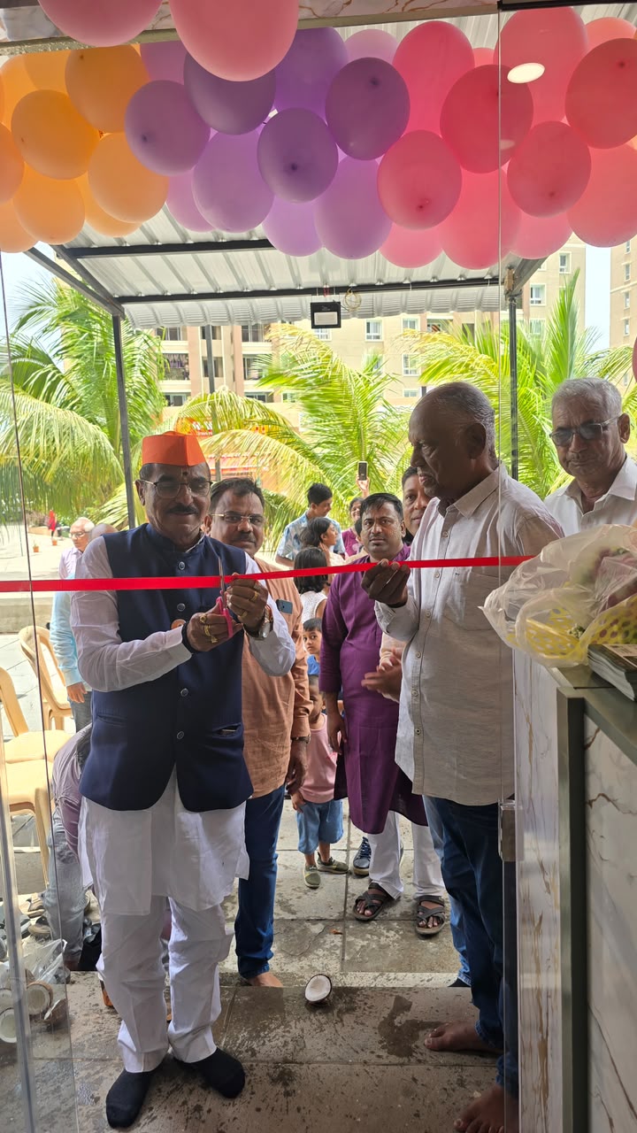 Ribbon-cutting ceremony at the store entrance